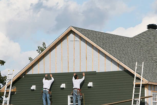 Professional Siding Repair technician working in East Liberty, OH